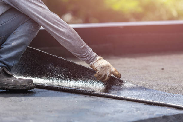 Professional Basement Waterproofing technician working in Trumbauersville, PA